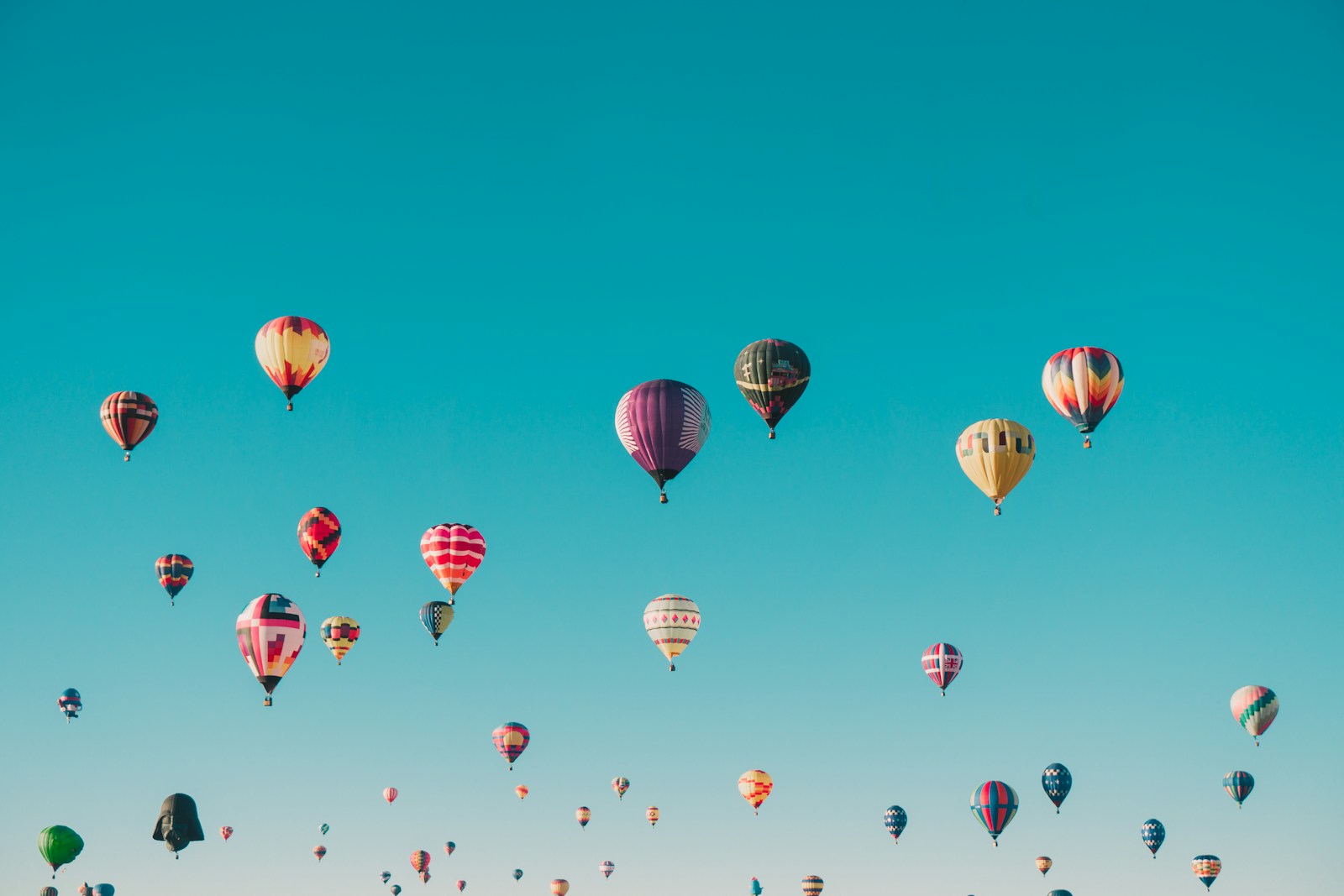 Photo by ian dooley assorted-color hot air balloons during daytime